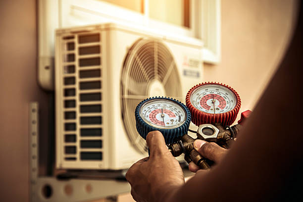 Professional Ductwork Repair technician working in Monponsett, MA